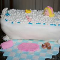 Bubble Bath Baby This is a buttermilk white cake with vanilla buttercream filling. Covered in fondant - all details sculpted out of fondant.
