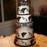 The_Cake.jpg This is my first wedding cake. The bride and groom had a fishing theme.