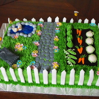 Garden I had a lot of fun making this one :) The mini veggies were my favourite part. Gumpaste veggies, flowers, bench, bees and ducks. Other...