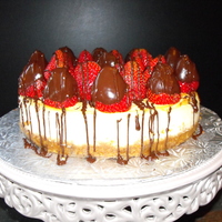 Fresh Strawberry Cheesecake Chocolate dipped and plain strawberries top this delicious baked, New York Cheesecake!!