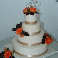 Fall Wedding Cake Marble cake with BC icing; champagne ribbon and real flowers & leaves.