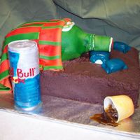 Jager Cake There was an episode of Ace of Cakes where they made a cake with a passed out Tequila bottle in a bed. Well this was my version, using...