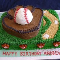 Baseball Theme 9x13 base with buttercream icing and grass tip. 9" round carved down to form the glove wit h buttercream icing. Baseball is from a...