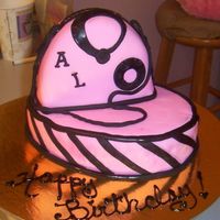 Pink And Black Purse Cake one of the spa girls says it's her birthday, can I make her a cake..anything,whatever I had..so I pulled a small oval cake I had been...