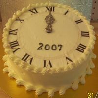 Quickie New Year's Cake A small last minute order for New Years. The hands are made from white chocolate and dusted with pearl dust to match the pearls that I...