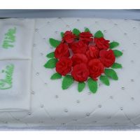 Bedofroses Fondant on chocolate cake, gum paste roses & leaves. Pillows are cake trimmings in fondant cases. I borrowed the quilting design from...