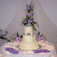 1St Wedding Cake All buttercream with scrolls and edible pearls.