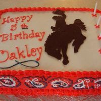 Western Cowboy The horse is a Dark Chocolate Transfer of a Wyoming Cowboy. They wanted red, so I made a red bandana around the sides.