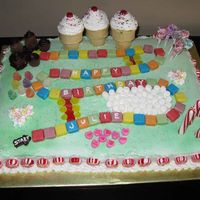 Candyland This is my version of the candyland cake from Taste of Home magazine. The road is made out of starbursts, the chocolate is reeses cups, and...