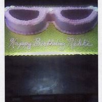 My First "carved" Cake This is made from a 9" round. Nikki and her mom were thrilled! Chocolate cake with vanilla and chocolate BC