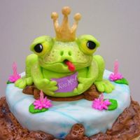 The Prince A birthday cake I desined for my single girlfriend. Before she could cut the cake, we all made her kis the frog/prince charming. She did!...