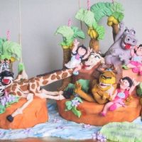 Madagascar All figerine were handmade based on the movie - Madagascar. The original colour of the cake is bright , unfortunately my camera cant...