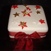 Coloured Stars fruit cake covered with fondant