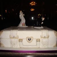 Luggage Wedding Cake Rich fruit cake covered in almond paste & fondant.