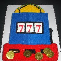 Slot Machine This cake was for a granny who loves to play the slots. buttercream with some fondant accents and edible chocolate coins.