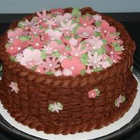 Chocolate Basket Weave This is a chocolate cake with chocolate filling that I added international coffee and cinnamon to . I used fondant flower cutouts for the...