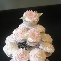 Gerbera Daisies I did these cupcakes for my sister-in-law for her birthday. I did some bag striping with pink to get the swirl look in the icing and then...