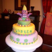 Barney Birthday Cake I got the Idea from a picture here at Cake Central. I loved it, and this is my version of it. Its a Biskuit with a jam filling. The Barney...
