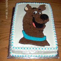 Scooby Doo One of two character cakes (birthday for twins) traced by hand on top then done with stars. The other is Ariel, The Little Mermaid.