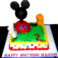 Mickey Mouse Clubhouse 14" square, covered in buttercream with fondant accents. Mickey's head is a styrofoam ball, body is cake, foot and hand are RKT...