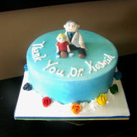 Small Retirement Gift This cake was a cake given by a child to his favorite docotor, who just so happens to love sweets:) All buttercream, duff roses, gumpaste...