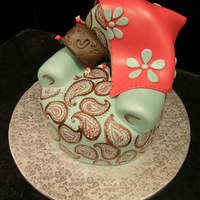 Chair 10" and half 8" round cut and carved to resemble chair.All fondant,painted details.TFL !