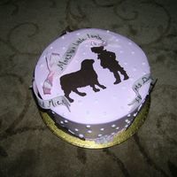 Nursery Rymes Baby shower cake.Chocolate transfers of characters and fondant ribbons to write on.TFL!