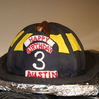 Firefighter Helmet Cake Thanks A TON to thecakemaker!! I baked a 10'' cake and used the soccer ball cake pan (the one that is just half of it by Wilton)...