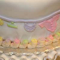 Close Up Of Layette On 'em This picture goes with the next one. It just shows the detail of the cake.