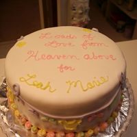 Layette On 'em The cake was done with fondant on top of BC. The clothes are fondant and detailed with BC. The booties are BC as well. I did cookies as a...