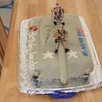 Army Abrams Tank I used the wilton 11x14 cake cut it in half and sculpt ed it how I wanted it. Then I put the "bad parts" as my 5 yr old calls...