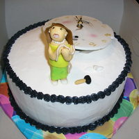 You Can't Stop Time! The cake is chocolate with strawberry filling. The woman is made of fondant, as it the face of the clock. The clock actually works! This is...