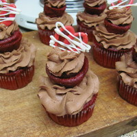 Valentine's Delight Red velvet cupcake with a chocolate buttercream, using a recipe I found here on CC! The topper is made of chocolate as well!