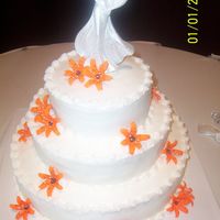 Snell Wedding This was a all white cake with buttercream frosting and royal icing lillies