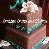 Brown And Blue 8" and 6" last minute cake for a bride who couldn't decide if she wanted a cake for her small wedding. Covered in brown...