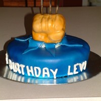 Wolverine Cake This is for my 7 yr old son. He requested a Wolverine cake, to look like the movie, not the cartoon. Fondant covered choc cake, airbrushed...