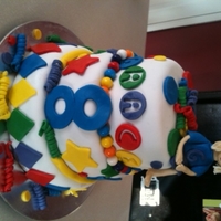 Primary Colors This was for my neice who was having a carnival themed party. Chocolate cake, with chocolate filling, covered in mmf, with mmf accents....