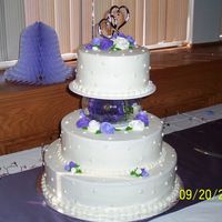 Purple Wedding Cake This is my first wedding cake. I made it for my nephews wedding. This is also my first posting of a cake on cake central. Hope that you all...