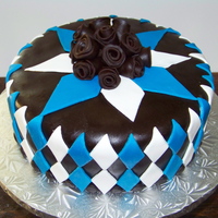 Blue And Brown Birthday Argyle inspired pattern. Chocolate fondant with fondant details. Thanks for looking!