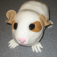 Guinea Pig Rice Krispies Guinea Pig covered in fondant and gumpaste.