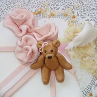 Teddy Bear Cake Ok, I just had to upload this picture, b/c it is sooo much clearer (although half is eaten and the roses are rearranged!) :)