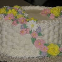 Img_20060905_0090.jpg This was my final cake for course II. I need a lot more practice with the basketweave and rope border, they didn't turn out so great!...