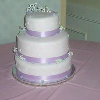 Forget-Me-Not Cake 3 tier cake (8'' top, 12'' middle and 14'' bottom) for 125 guests. Cake is covered in Pink Fondant and...