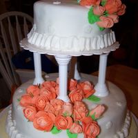 My First Wedding Cake This was my cake for my final 2nd course. It is chocolate on the large round and vanilla on the small, covered in fondant with fondant...