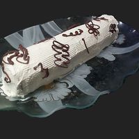 Chocolate Cookie And Whipped Cream Cake Log This cake log was made with large thin chocolate cookies standing on edge and whipped cream inbetween. The cookies expand from the moisture...