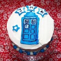 Tardis Cake Whipped cream frosting with fondant TARDIS, stars and balls. I just toothpicked in some Wilton color for the details. J.M.K. are birthday...