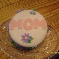 010_-_Copy_3.jpg First time I ever used fondant. I made MMF and wanted to try and decorate with it. Mom liked the cake, didn't like the fondant. She...