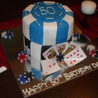 50Th Birthday Cake Poker chips are 8" chocolate cake covered in fondant..