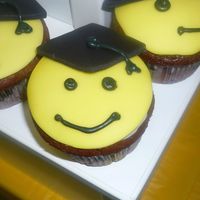 Smiley Face Graduation This was for my son's kidergarten graduation. I had to make 100 of these but they were greta. The kids loved them. All fondant tops....