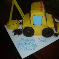 Digger This was for my son, who insisted on a digger cake for his birthday!